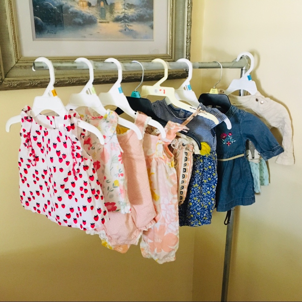 A bundle including 4 dresses and 3 sun suits (jumpers)